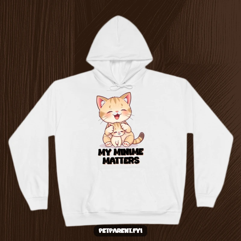 Funny hoodie featuring a nurturing cat character grooming a very small kitten with gentle care, perfect for cozy cat cuddles.