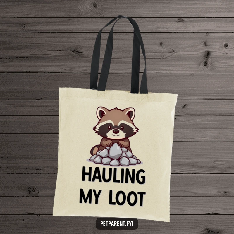 Funny raccoon tote bag displaying a protective raccoon character guarding shiny rocks, symbolizing a love for treasures and a mischievous spirit.